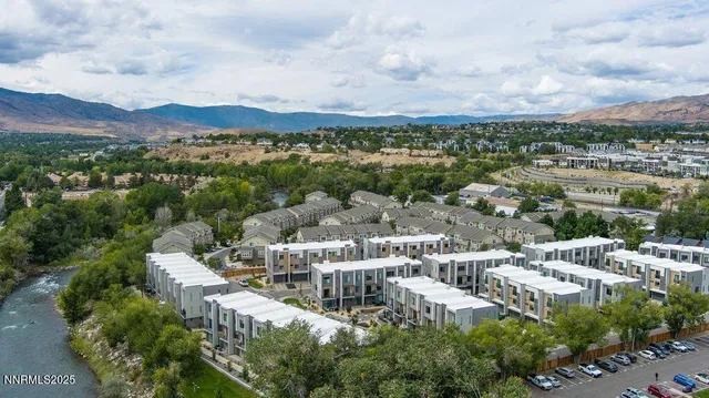 a view of a city with a lake