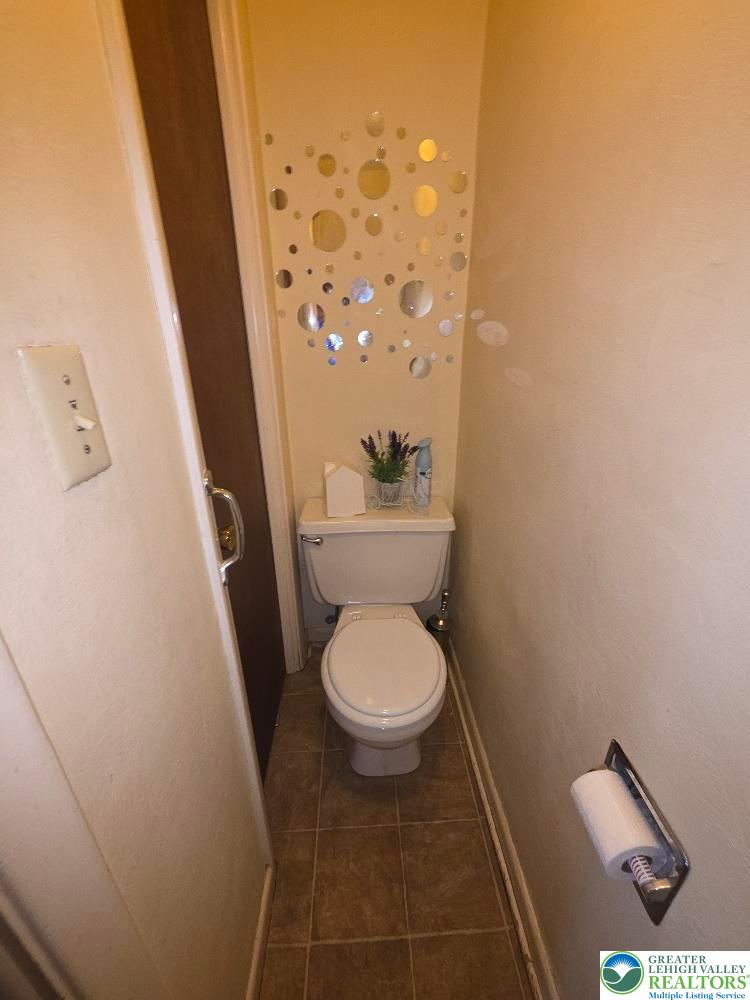 41 South 4th Street Allentown, PA 18102 - Photo 14 of 19 a bathroom with a toilet and a shower