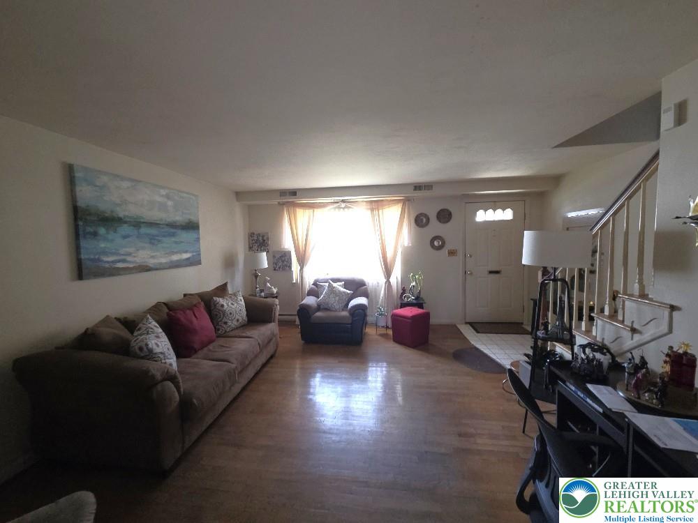 41 South 4th Street Allentown, PA 18102 - Photo 3 of 19 a living room with furniture and wooden floor