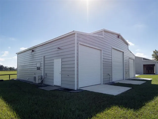 a view of a kitchen with dining table and chairs