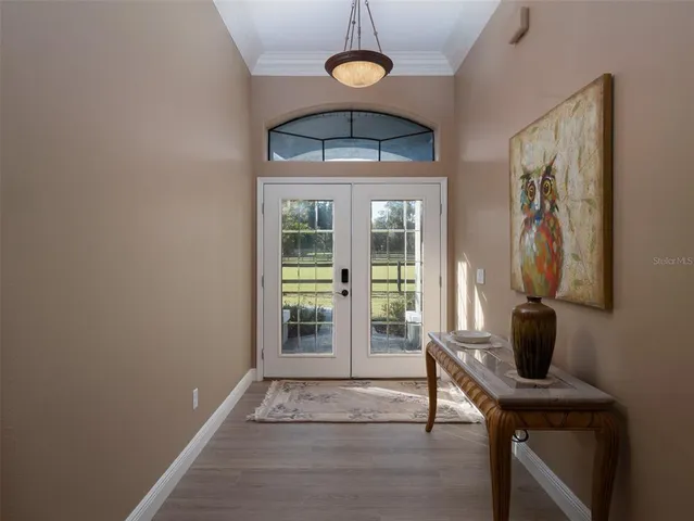 a view of a hallway with workspace