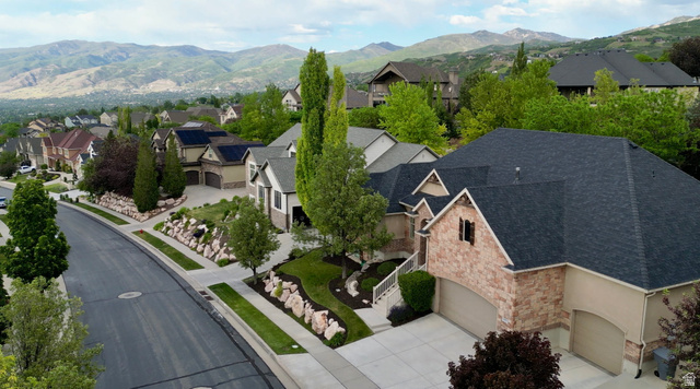 577 South Ridge Top Lane East North Salt Lake, UT 84054 - Photo 57 of 57 Located in one of the area's most desirable luxury neighborhoods, this beautifully landscaped property offers outstanding curb appeal, generous setbacks, and a private setting framed by mature trees and custom rock landscaping.