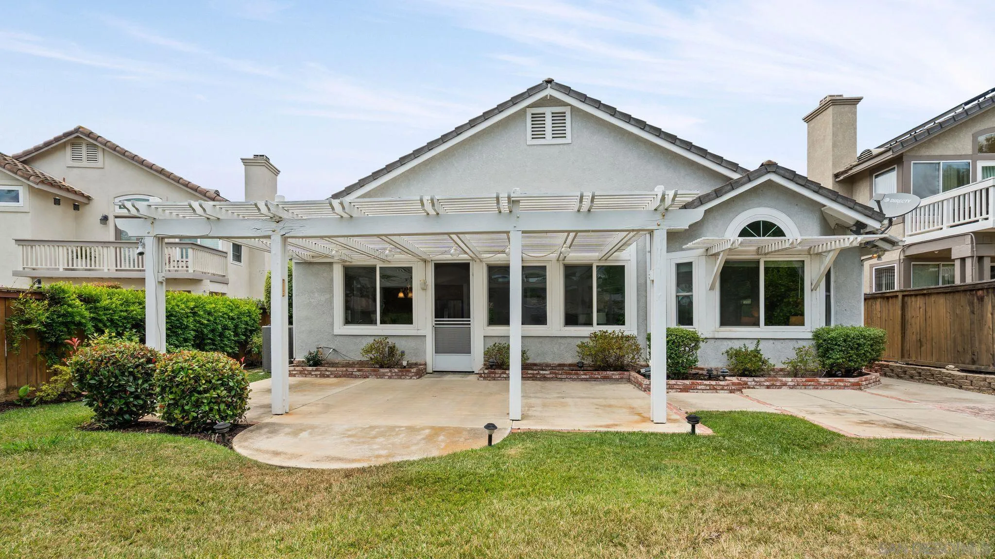 1783 Medinah Road San Marcos, CA 92069 - Photo 29 of 39 a front view of a house with a yard and porch