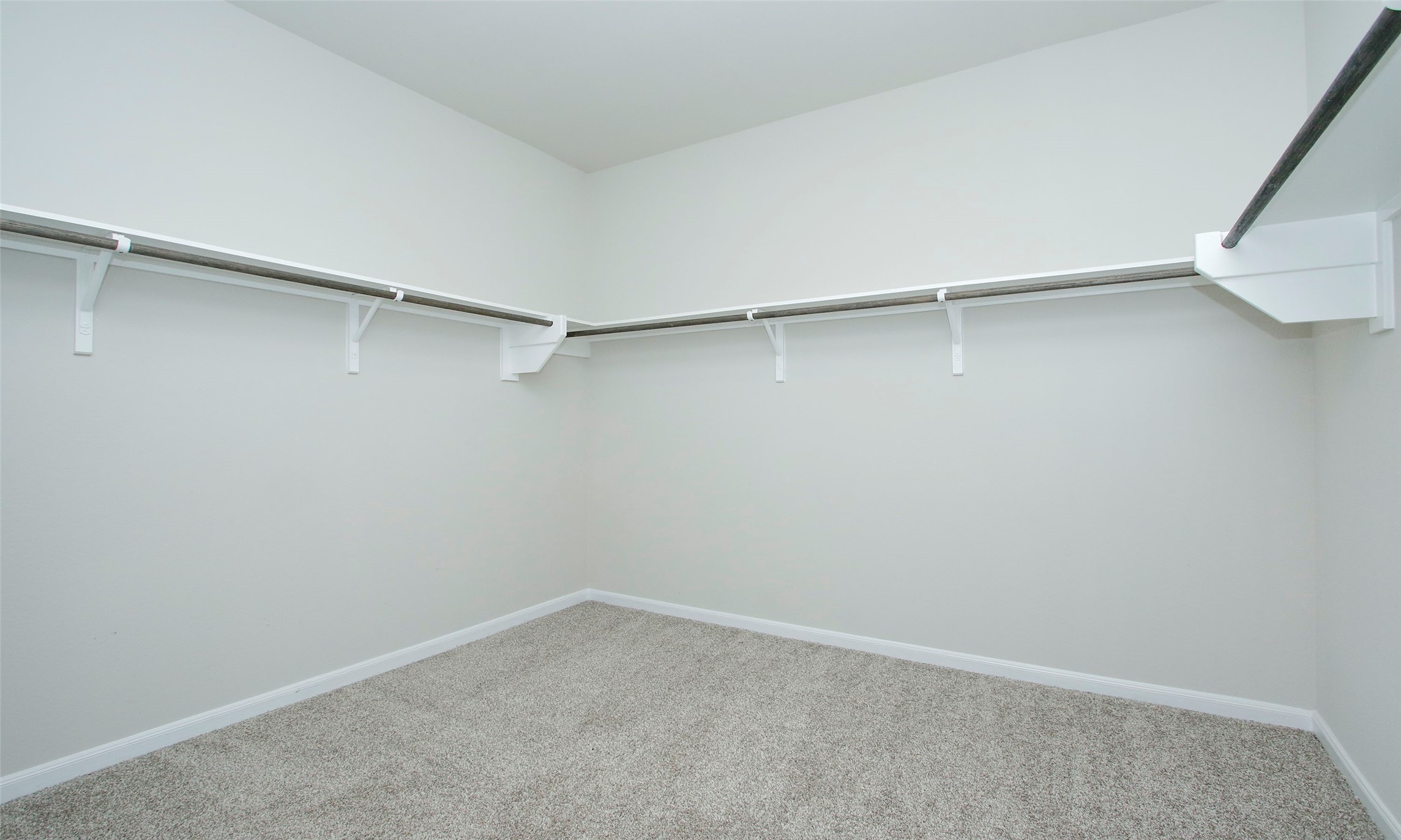 14120 Sand Ridge Court Conroe, TX 77384 - Photo 25 of 43 a view of an empty walk in closet