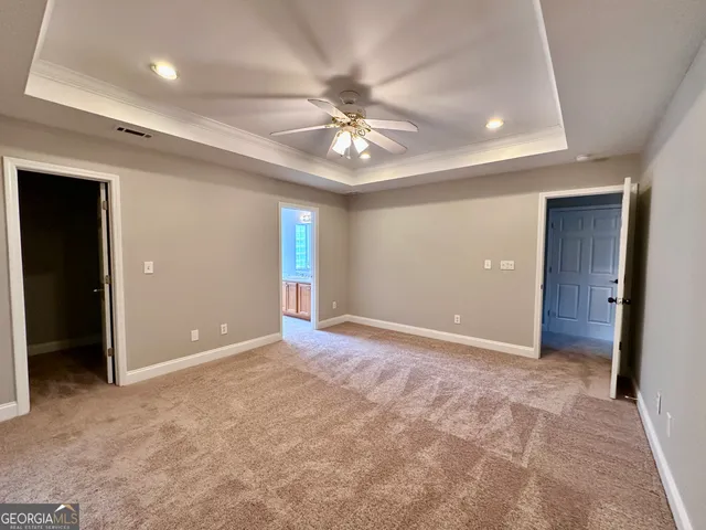 a bathroom with a shower and a toilet