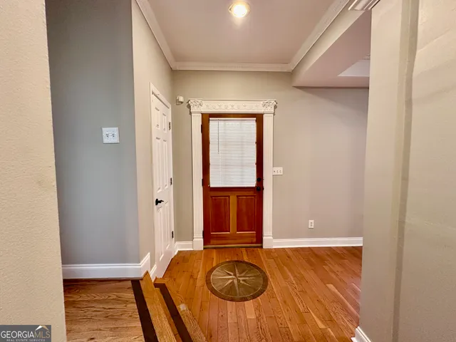 wooden floor and window in a room