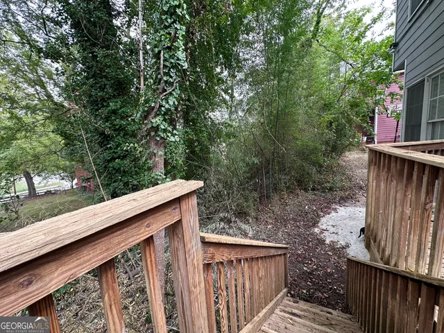 a view of balcony with furniture