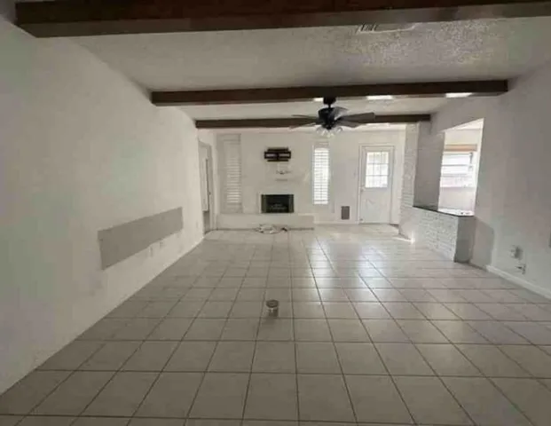 a view of a livingroom with a fireplace