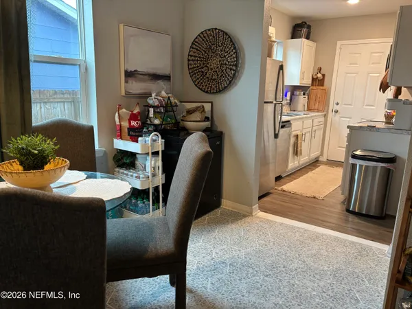 a dining room with furniture