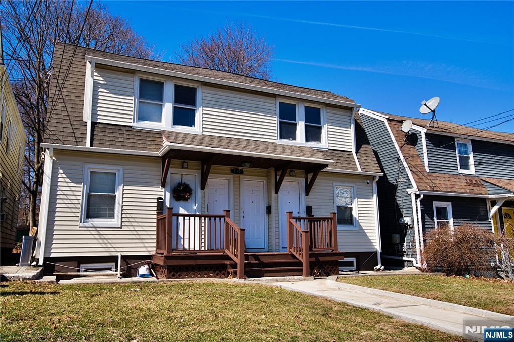 116 Maple Avenue, Unit 4 Montclair, NJ 07042 - Photo 2 of 14 a front view of a house with a yard