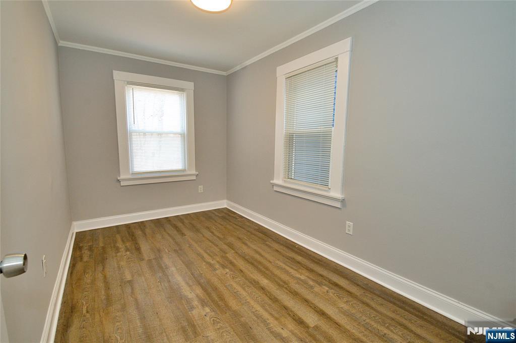 116 Maple Avenue, Unit 4 Montclair, NJ 07042 - Photo 8 of 14 an empty room with window