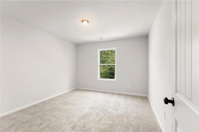 an empty room with an entryway