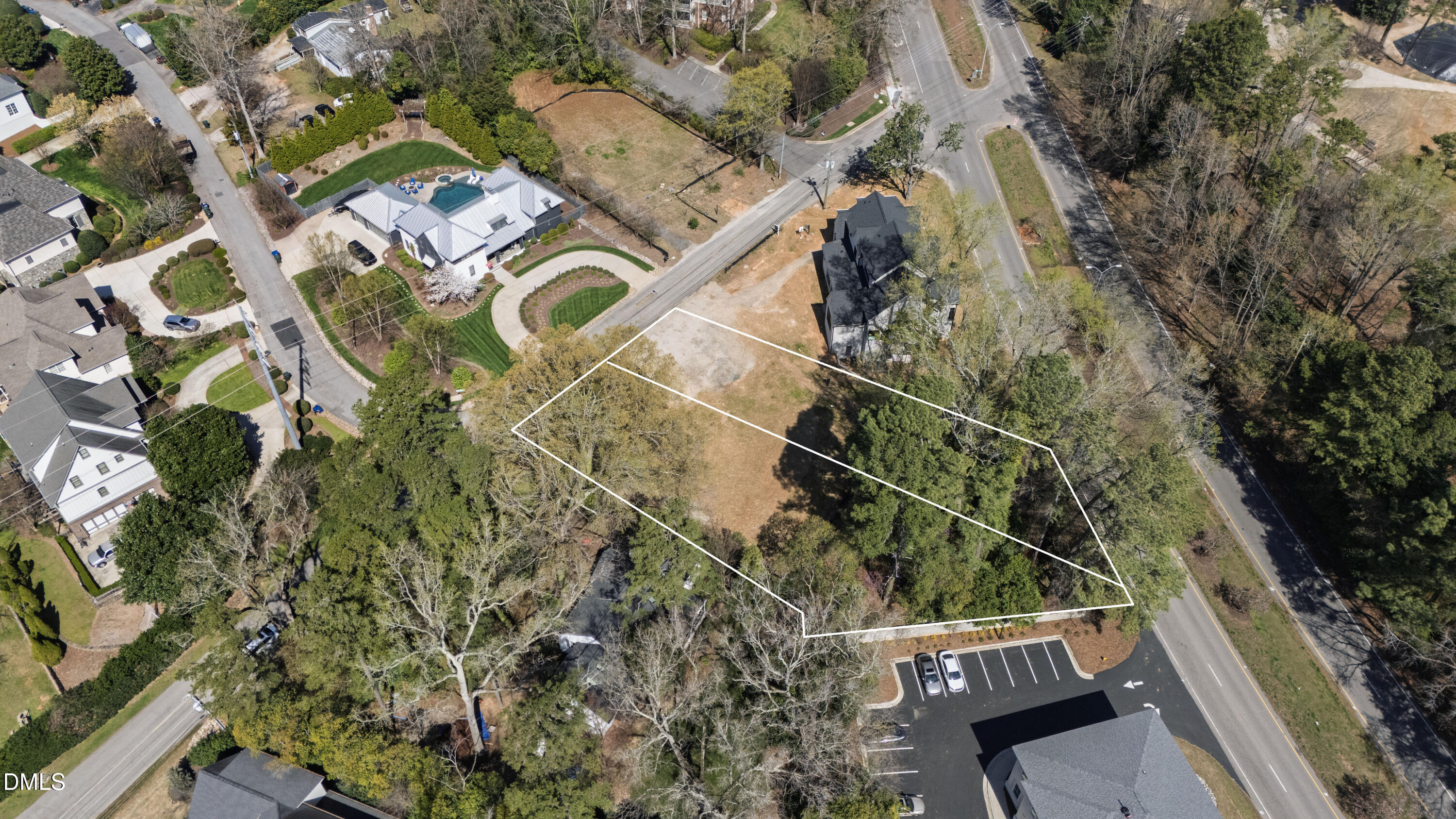 109 Edenburgh Road Raleigh, NC 27608 - Photo 9 of 10 an aerial view of a house with a yard
