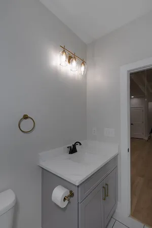 a bathroom with a sink and mirror