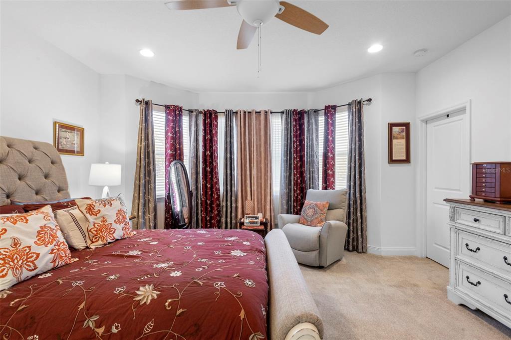 744 Hyperion Drive DeBary, FL 32713 - Photo 22 of 54 a bedroom with a bed and a television