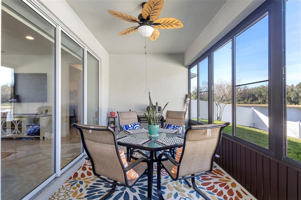 744 Hyperion Drive DeBary, FL 32713 - Photo 38 of 54 a view of a dining room with furniture window and outside view