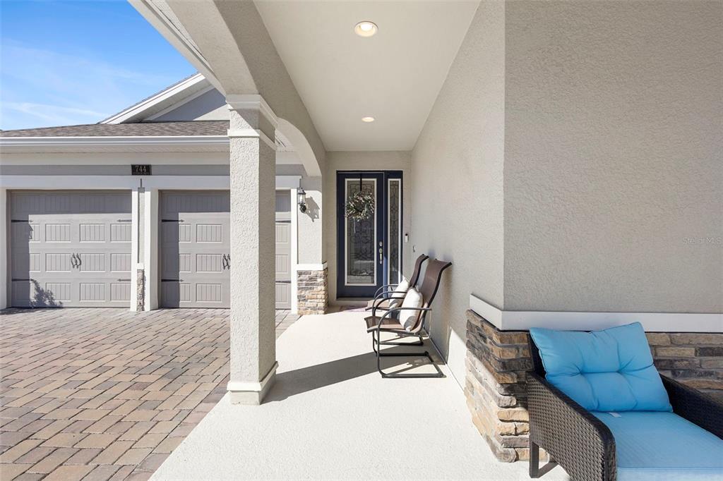 744 Hyperion Drive DeBary, FL 32713 - Photo 5 of 54 a view of a livingroom with lounge chair and a ceiling fan