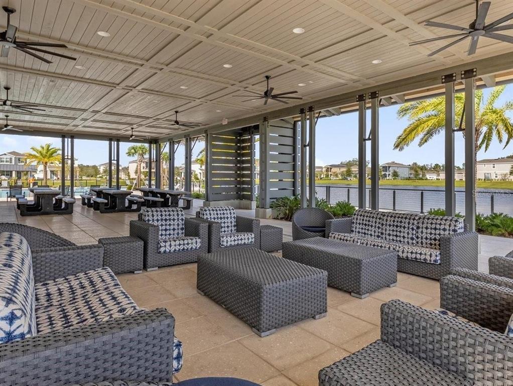 744 Hyperion Drive DeBary, FL 32713 - Photo 53 of 54 a living room with furniture and a large window