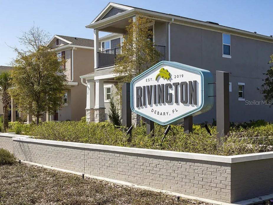 744 Hyperion Drive DeBary, FL 32713 - Photo 54 of 54 a front view of a house with a yard and garage