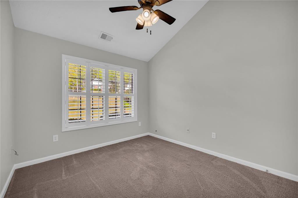201 Wisteria Way Athens, GA 30606 - Photo 21 of 38 a view of an empty room with a window