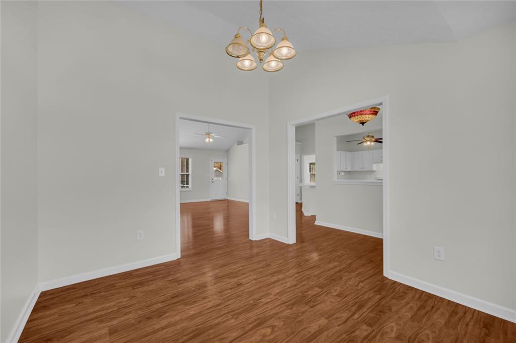 201 Wisteria Way Athens, GA 30606 - Photo 24 of 38 a view of empty room with wooden floor