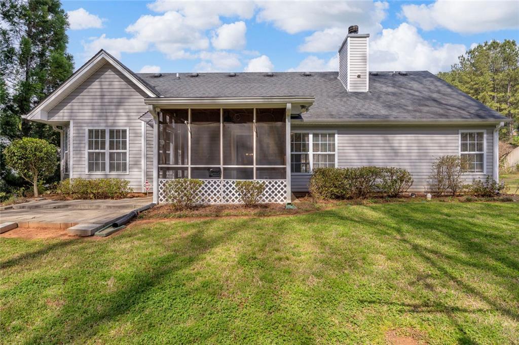 201 Wisteria Way Athens, GA 30606 - Photo 29 of 38 a front view of a house with a garden