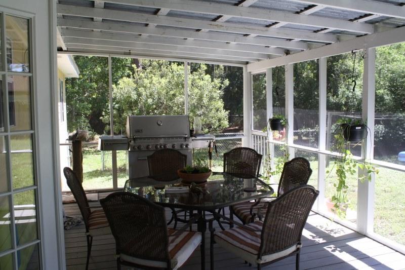 53 Mandy Circle Santa Rosa Beach, FL 32459 - Photo 13 of 13 a view of a dining room with furniture wooden floor and outer view