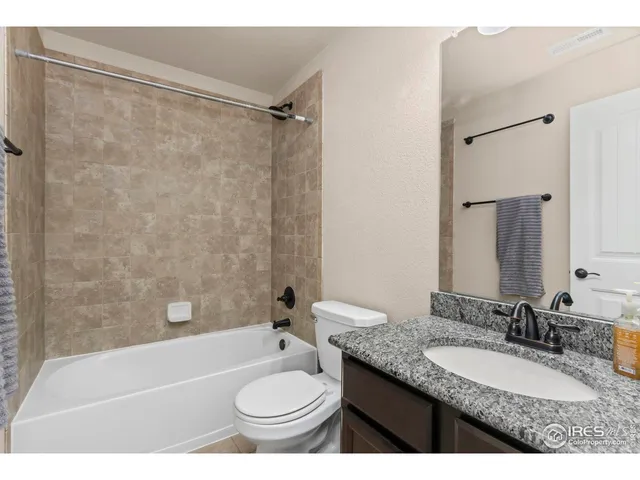 a view of a living room and a window