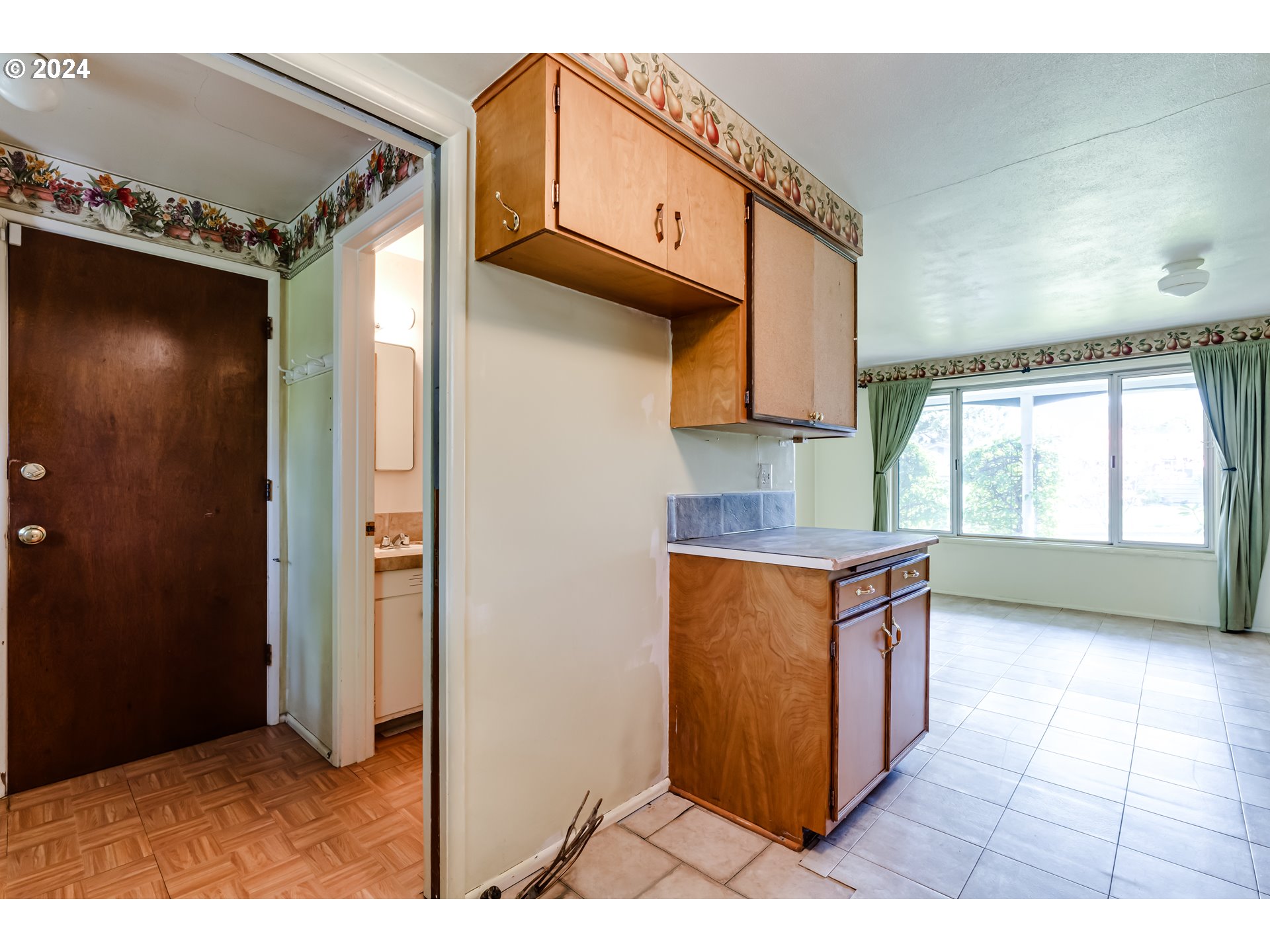 125 East 39th Place Eugene, OR 97405 - Photo 14 of 30 a kitchen with stainless steel appliances granite countertop a refrigerator and a sink