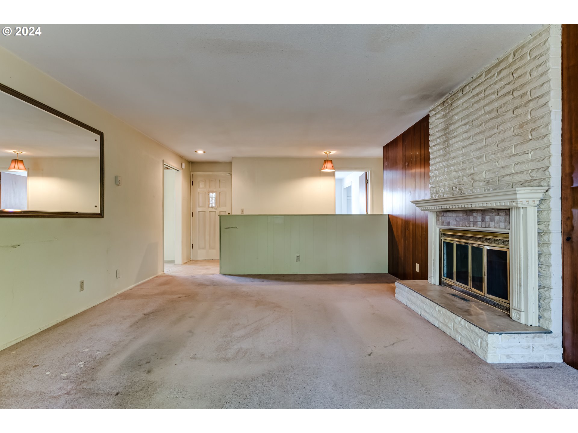 125 East 39th Place Eugene, OR 97405 - Photo 7 of 30 a view of empty room with a fireplace