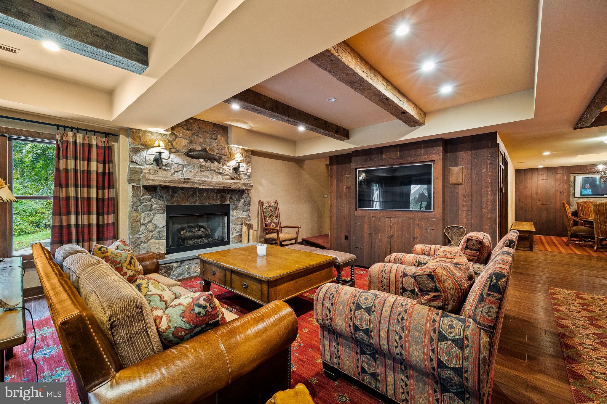 484 King Of Prussia Road Wayne, PA 19087 - Photo 50 of 98 a living room with furniture and a fireplace
