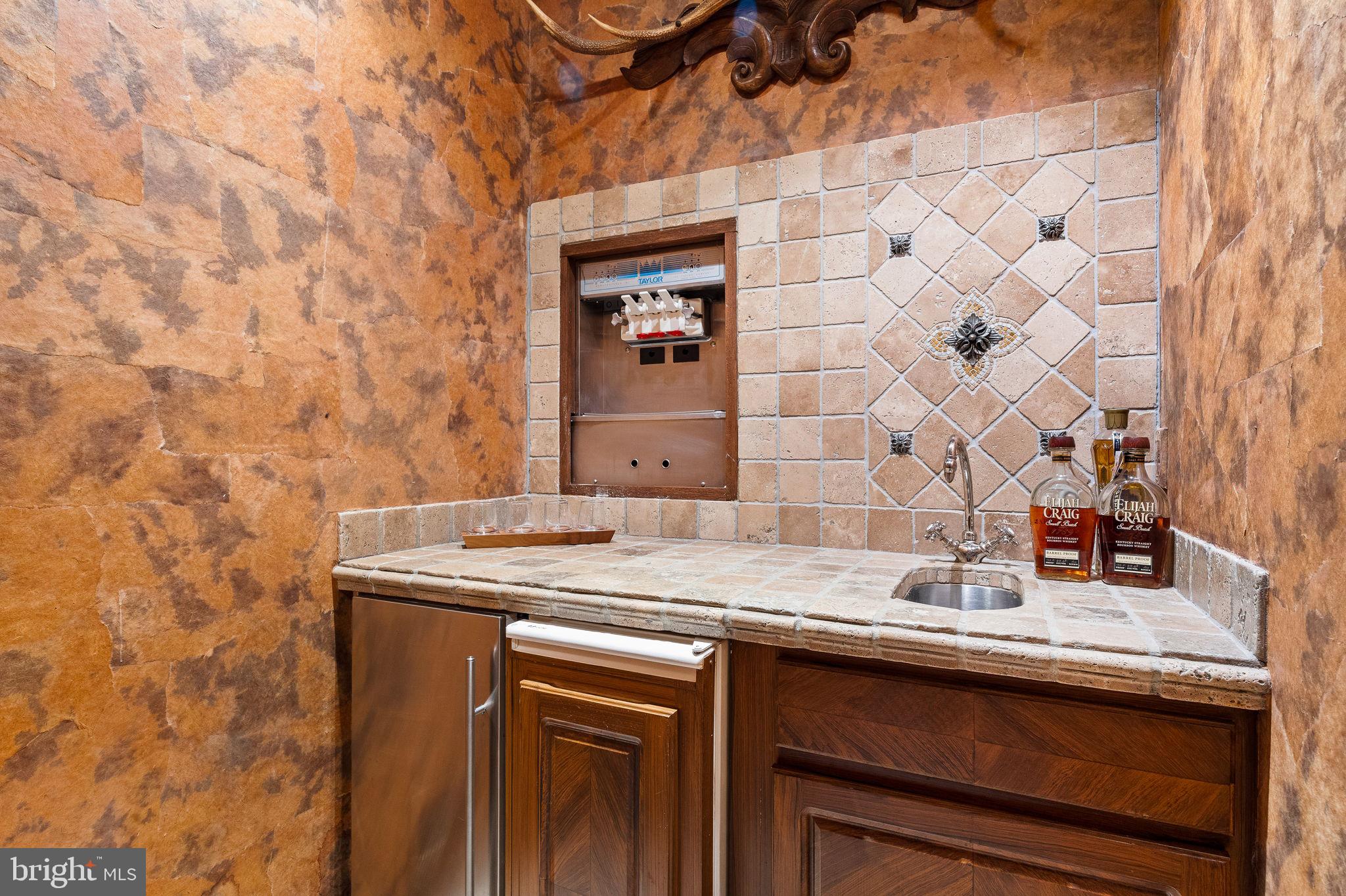 484 King Of Prussia Road Wayne, PA 19087 - Photo 61 of 98 a bathroom with a granite countertop sink and a mirror