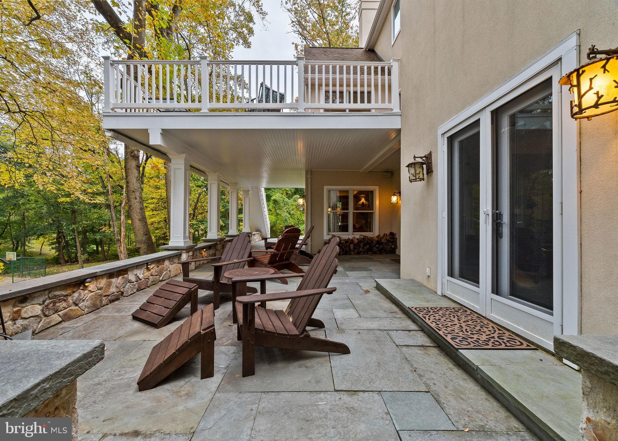 484 King Of Prussia Road Wayne, PA 19087 - Photo 68 of 98 a view of a patio with table and chairs and potted plants