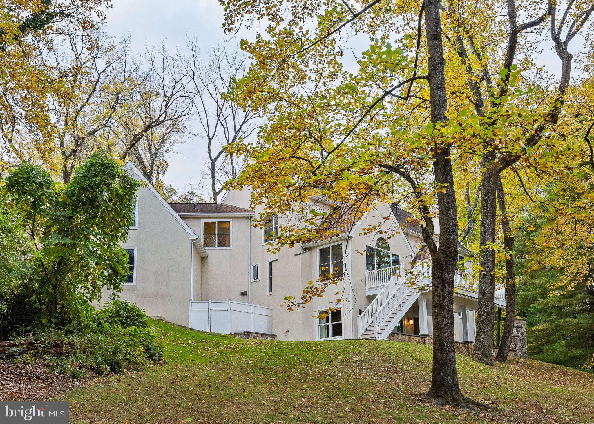 484 King Of Prussia Road Wayne, PA 19087 - Photo 75 of 98 a front view of house with yard and trees in the background
