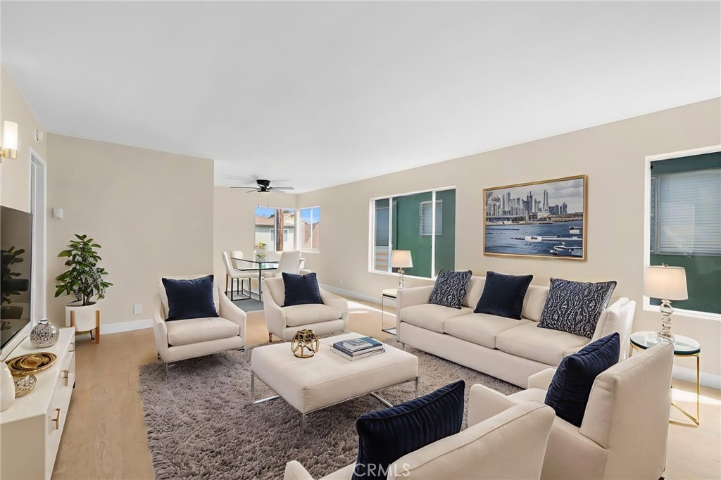 3020 East 3rd Street Long Beach, CA 90814 - Photo 23 of 63 a living room with furniture and a couch