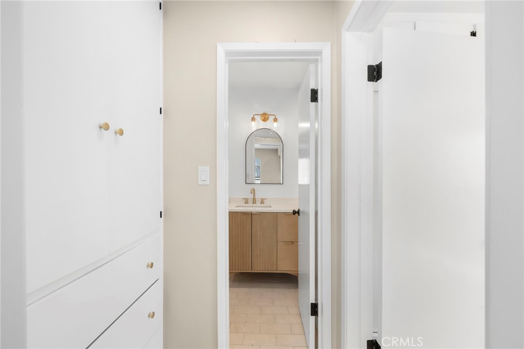 3020 East 3rd Street Long Beach, CA 90814 - Photo 52 of 63 a bathroom with a mirror
