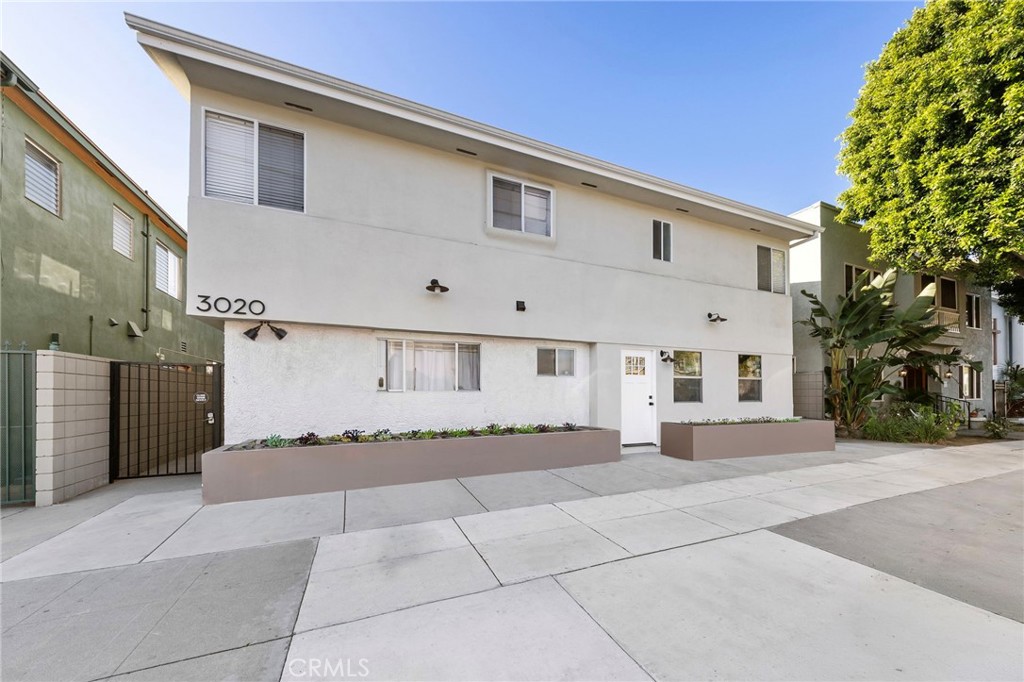 3020 East 3rd Street Long Beach, CA 90814 - Photo 59 of 63 a view of a house with a yard