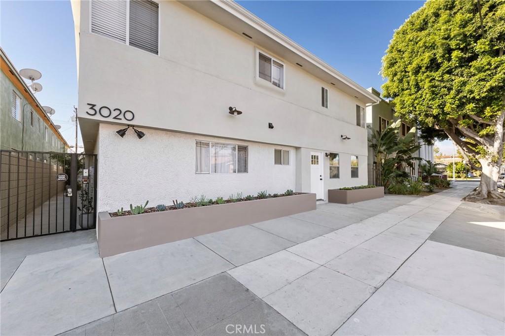 3020 East 3rd Street Long Beach, CA 90814 - Photo 61 of 63 a view of a house with a road