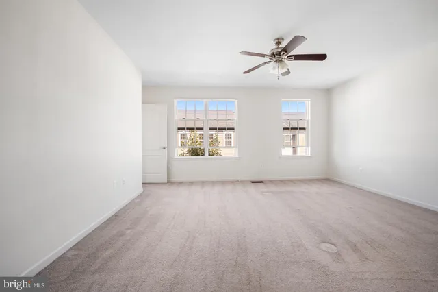 a view of a balcony with wooden floor