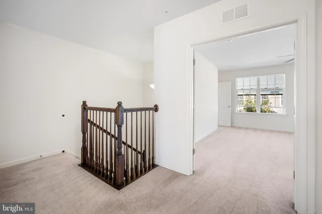a bathroom with a toilet a sink and shower