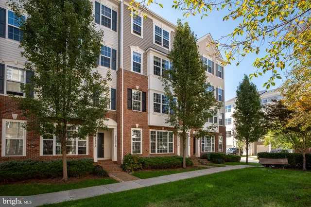 front view of a building with a yard