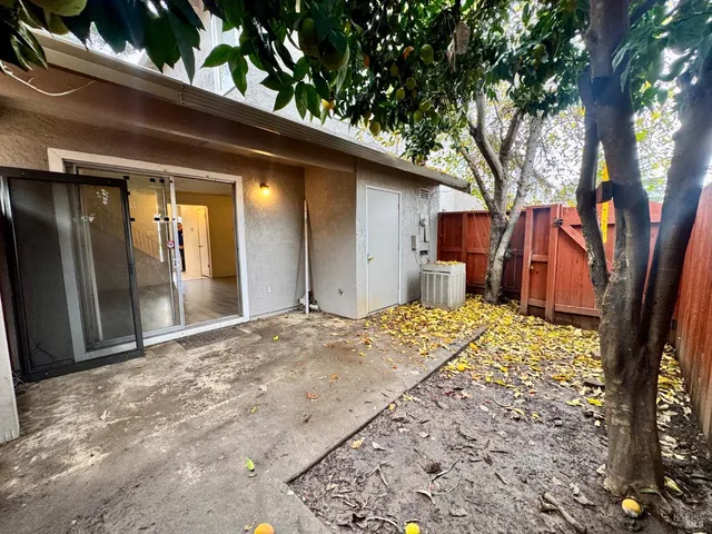 a view of a backyard of the house