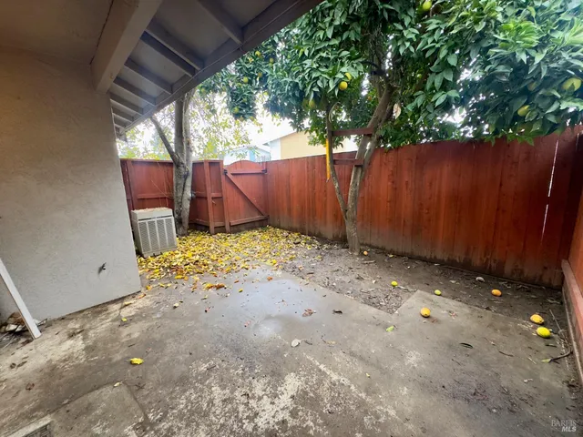 a view of a backyard of the house