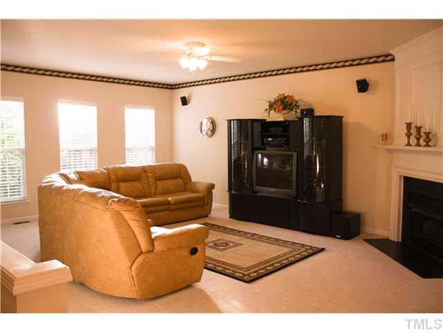 7220 Janston Drive Raleigh, NC 27613 - Photo 20 of 20 Large Family Room Features Fireplace and Open Floor Plan