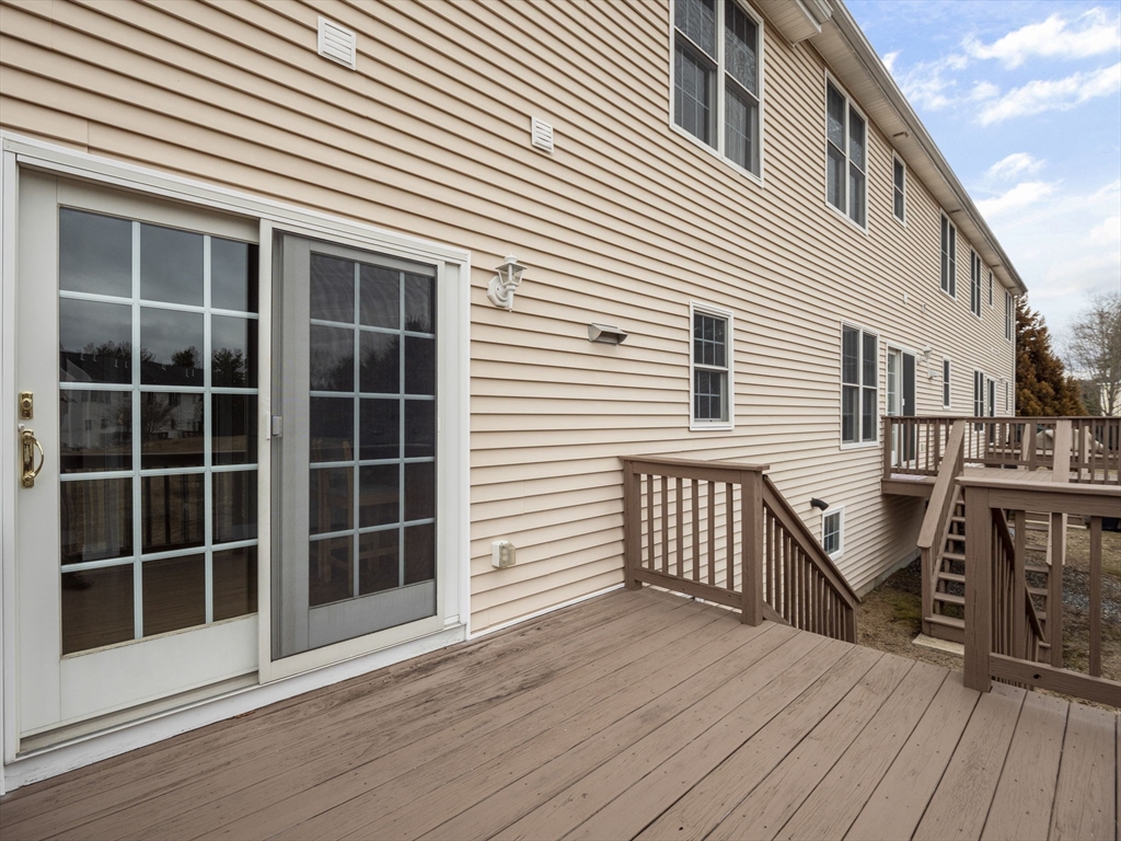 36 Knowlton Circle, Unit 36 Upton, MA 01568 - Photo 2 of 39 a view of a house with a balcony