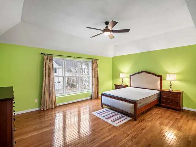 a room with a bed and a window