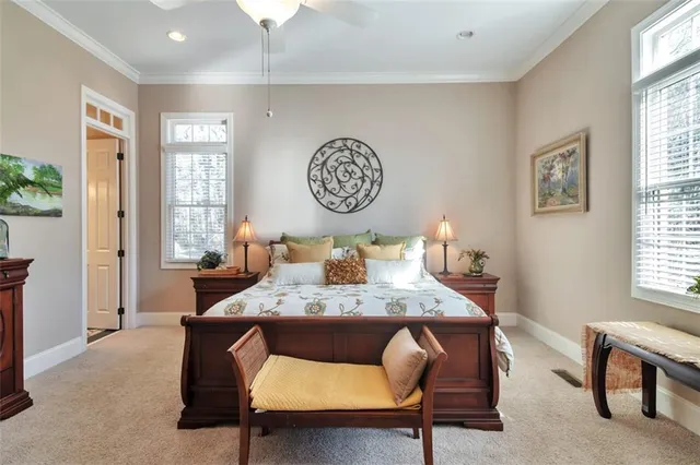 a room with furniture and a large window