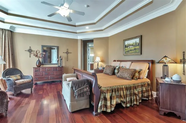 a bathroom with a tub shower and sink