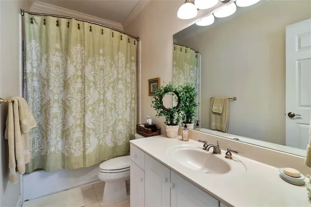 a living room with lots of furniture and a fireplace