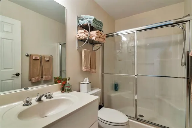 a view of a room with lots of gym equipment